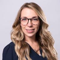 headshot image of Emily Scoggins