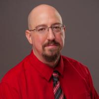 headshot image of Evan Campbell