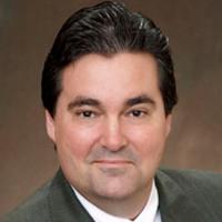 headshot image of Glenn Leach