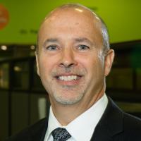 headshot image of Gus Branda