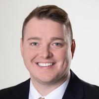 headshot image of Jake Jones