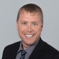 headshot image of Jamie Hughes