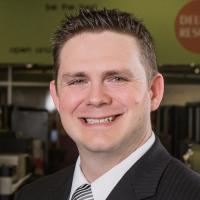 headshot image of Jason Crone