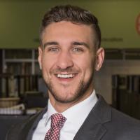 headshot image of Joel Grisamore