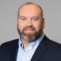 headshot image of Joel Smith