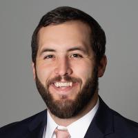 headshot image of John Schnurbusch