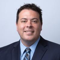 headshot image of Joshua Dugo