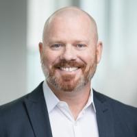 headshot image of Joshua Schmidt
