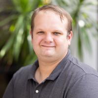 headshot image of Justin Cupp