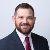 headshot image of Justin Griffith