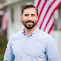 headshot image of Justin Miller