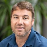 headshot image of Kris Carmichael