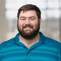 headshot image of Kristofer Doran