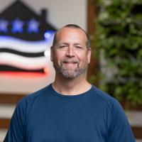 headshot image of Kyle Bakker