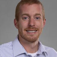 headshot image of Michael Schneider