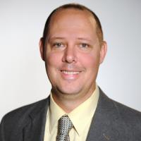 headshot image of Nathan Reeves