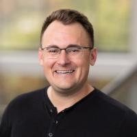 headshot image of Neil Hansen