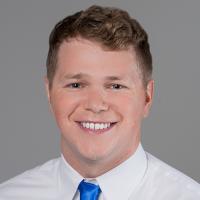 headshot image of Ryan Herman