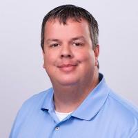 headshot image of Tim Glover