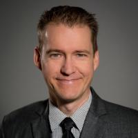 headshot image of Tim Overshiner