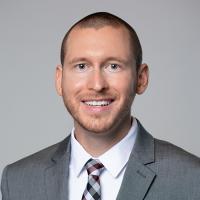headshot image of Thomas Champion