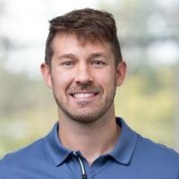 headshot image of Travis Ward