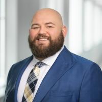 headshot image of Tyler Brockman