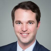 headshot image of Tyler Schuster