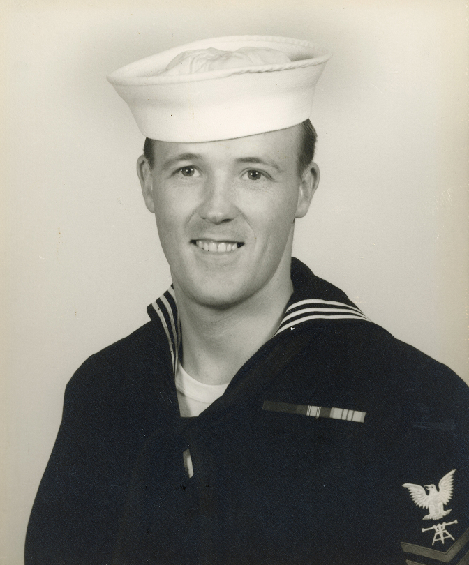 Everett Kincheloe smiling in a U.S. Navy uniform portrait.