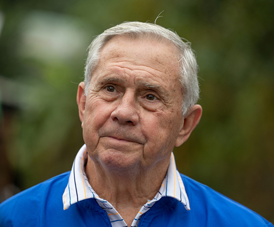 Robert "Bob" Saunders Jr. looking into the distance outdoors in Vietnam.